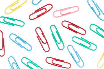 multicolored paper clips isolated on white background. close up