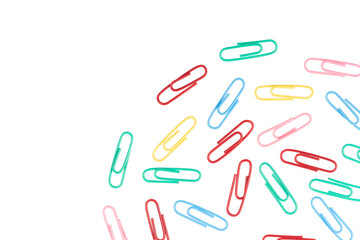 multicolored paper clips isolated on white background. close up