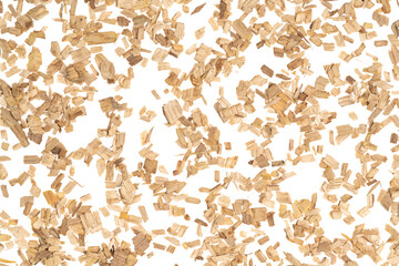 Wooden chips isolated white background. small wood chips for smoking. sawdust texture. ecological fue