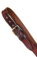 Leather belt  on a white background. Close-up.