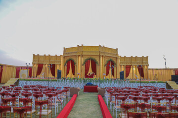 India Wedding event stage decorated with flower, chair, light