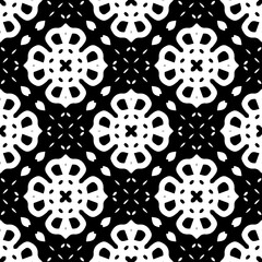 White background with black pattern. Seamless texture for fashion, textile design,  on wall paper, wrapping paper, fabrics and home decor. Simple repeat pattern.