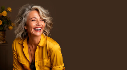 Portrait of a beautiful smiling elderly woman with gray hair