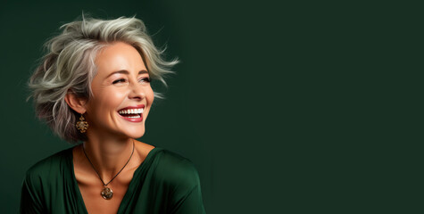 Portrait of a beautiful smiling elderly woman with gray hair