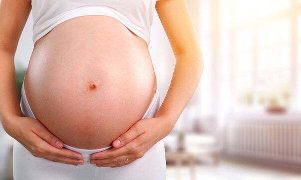 pregnant woman naked belly hold in hands, AI generated image