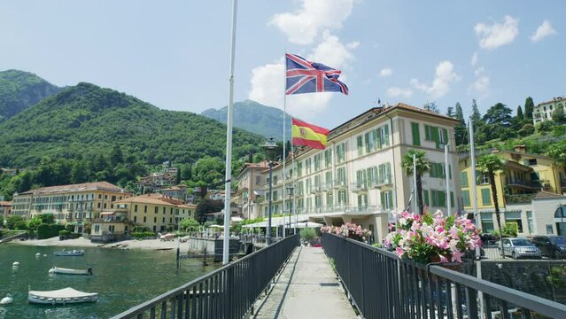 International flags waving in the port of Menaggio, Lake Como, Italy