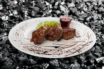 Tasty fresh hot cooked meat steak dish. Restaurant menu