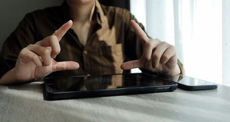 Creative Multiethnic Female Working on Laptop Computer in a Company Office. Happy Driven Project Manager Browsing Internet, Writing Tasks, Developing a Marketing Strategy for a Financial Institution.