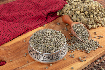 Okra seeds, large quantity of organic okra seeds. Detail of dried okra seeds. Ambrette Seed Background (Abelmoschus Moschatus).