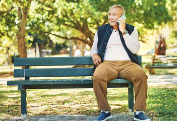 Senior man, phone call and park with conversation and bench outdoor with communication. Nature, discussion and mobile networking with an elderly male person speaking and listening in urban garden - obrazy, fototapety, plakaty