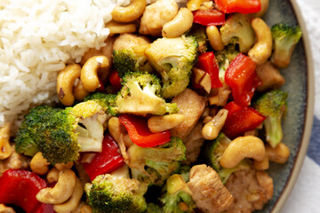 Homemade Cashew Chicken Stir-Fry on a Plate, top view. Close-up.