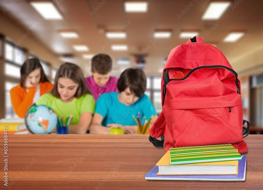 Canvas Prints Child's school backpack on table in classroom, AI generated image