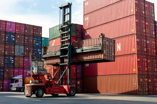 Istanbul, Beylikduzu - Turkey - 07.07.2023 Container yard for Logistic Import Export business, colorful container stack. view from moment of load. crane truck.
