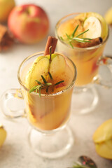 Warm apple autumn drink with cinnamon