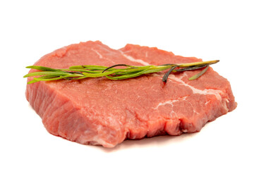 Beef round slice isolated on white background. Raw beef round with herbs and spices