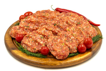 Meatballs isolated on white background. Raw beef meatballs with herbs and spices
