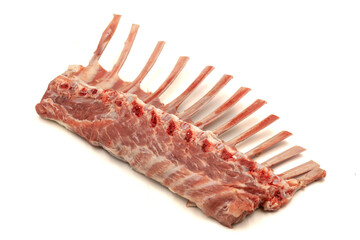Lamb rack cutlet isolated on white background. Raw lamb chops with herbs and spices
