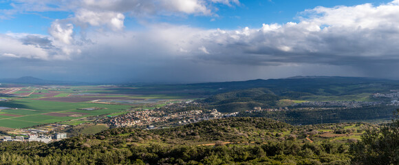 Fototapeta na wymiar Panoramic view of the Jezreel Valley from the Carmel Mountain at Muhraqa viewpoint. 