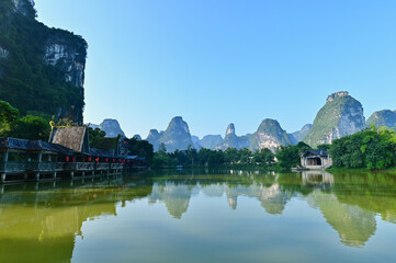 Beautiful Karst Landscape of Mingshi Pastoral with Reflection on Water in Guangxi, China