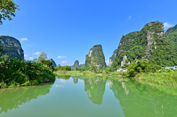 View of River and Karst Landscape of Mingshi Pastoral in Daxin County, China