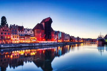 Illuminated Gdansk Old Town with Calm Motlawa River at Dusk, Poland