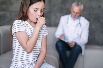 Preteen girl feeling bad and coughing at appointment with doctor at home