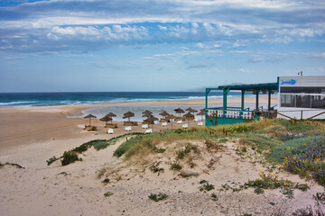 Fototapeta na wymiar Spain, Tarifa, empty sandy beach and sea