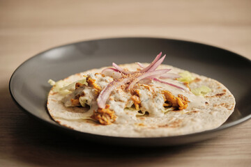 Miniature marvel: A compact taco with all the zest and spices of its full-sized counterpart.