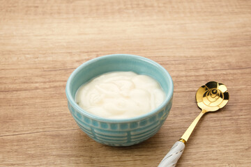 Fresh Healthy Plain Yogurt in a small bowl

