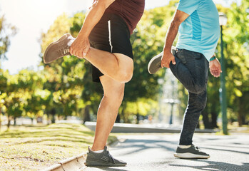 People, friends and stretching legs in park for running, exercise or outdoor training together in...