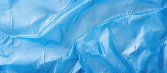 Obraz premium Blue plastic bag environmental issues recycling waste