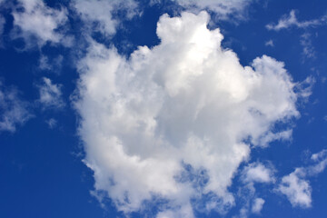 white cloud isolated on dark blue sky close up