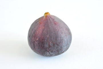 purple fig isolated on white background close up  
