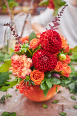 Master class on making bouquets. Autumn bouquet in a pumpkin. Flower arrangements, creating beautiful bouquets with your own hands