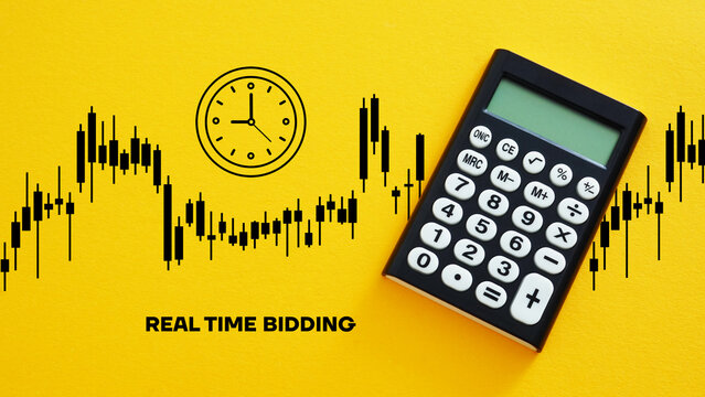 Real Time Bidding RTB is shown using the text and photo of calculator and chart