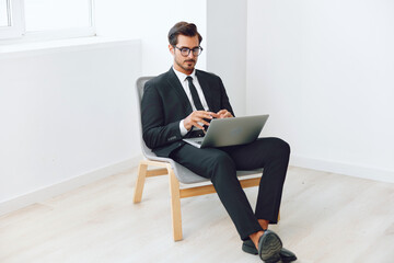 Man office executive business sitting professional chair winner businessman technology happy job laptop