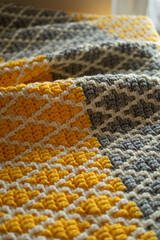 Yellow and gray mosaic pattern crochet