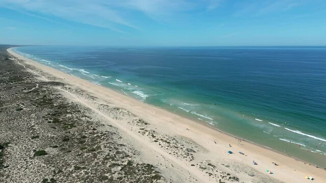 Aerial view of a beach in Portugal on a sunny day with drone