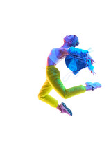 Attractive excited fitness girl dancer in sportwear dance in neon light in air isolated over white...
