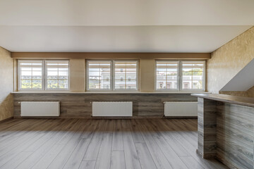 Indoor view of an empty attic of a new modern house