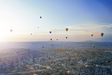 Beautiful morning scene with Hot air balloons flying over Cappadocia at sunrise, Turkey