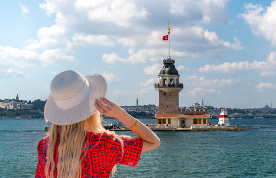 The Maiden's Tower (Turkish: Kız Kulesi), also known as Leander's Tower (Tower of Leandros) and tourist girl watches the tower from Salacak Uskudar beach.