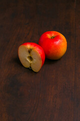 red apple on a beautiful wooden base