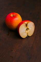 red apple on a beautiful wooden base