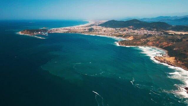 Aerial view of the Brazilian coastline with rough Atlantic Ocean. Area near the town of Imbituba