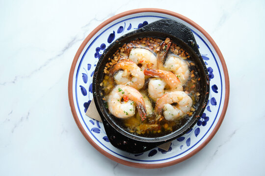 Bowl of shrimps sauteed in butter and garlic
