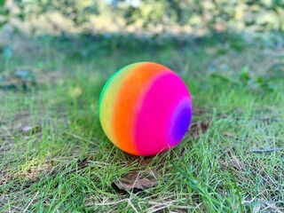 Multi colored beach ball on playground