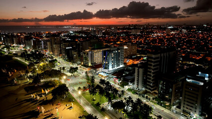 Obraz premium Sunset sky at town of Maceio Alagoas Brazil. Landmark beach at Northeast Brazil. Tropical Travel. Vacations destinations. Tourism landmark.