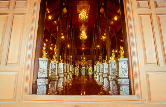 Museam of Wat Krathum Suea Pla(temple) ,Bangkok, Thailand. the principal body of a Buddha statue 80. And surrounded by 80 smaller Lord Buddha in various postures.