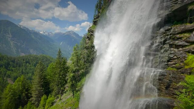 Stuibenfall waterfall bigest waterfall in Tirol in the &Ouml;tztal valley in Tyrol Austria during a beautiful springtime day in the Alps. Slow motion clip.